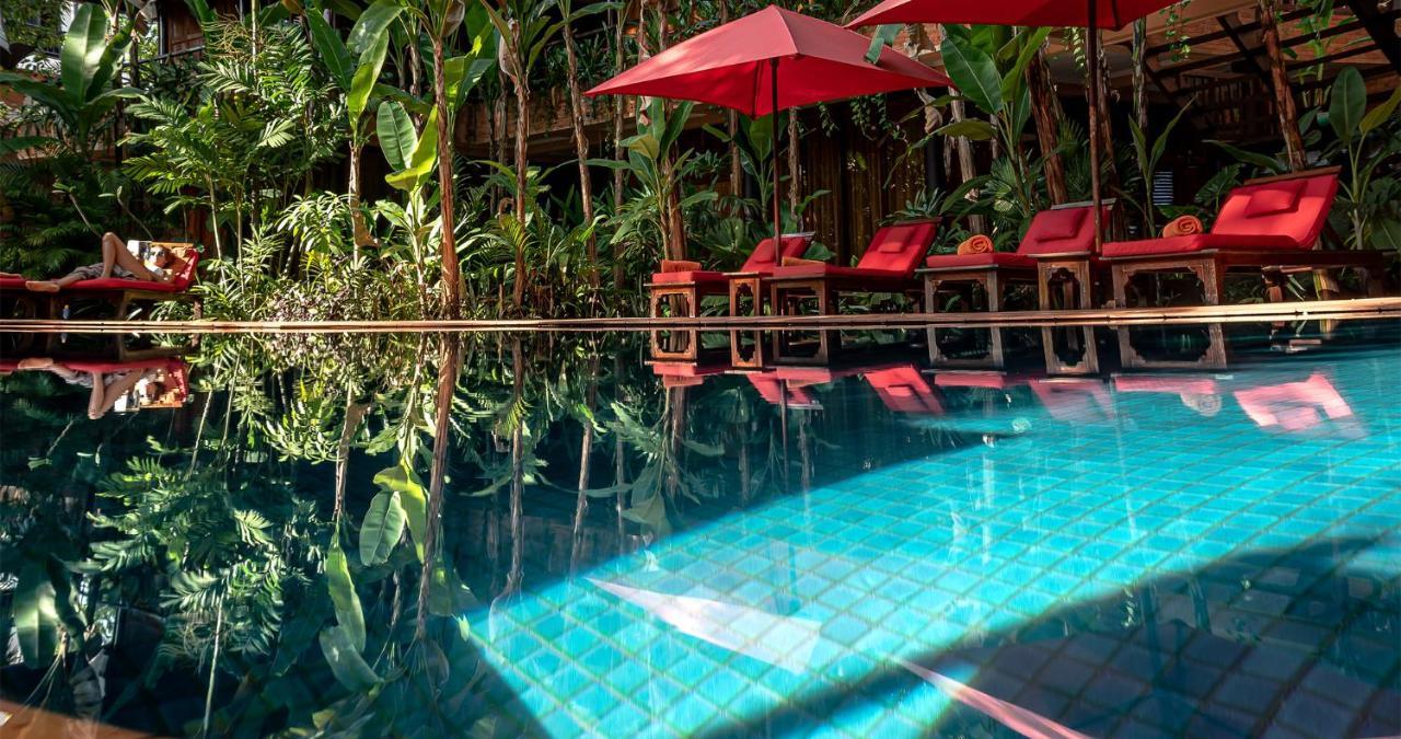 סיאם ריפ Angkor Village Hotel - Small Luxury Hotels Of The World מראה חיצוני תמונה The swimming pool at the resort
